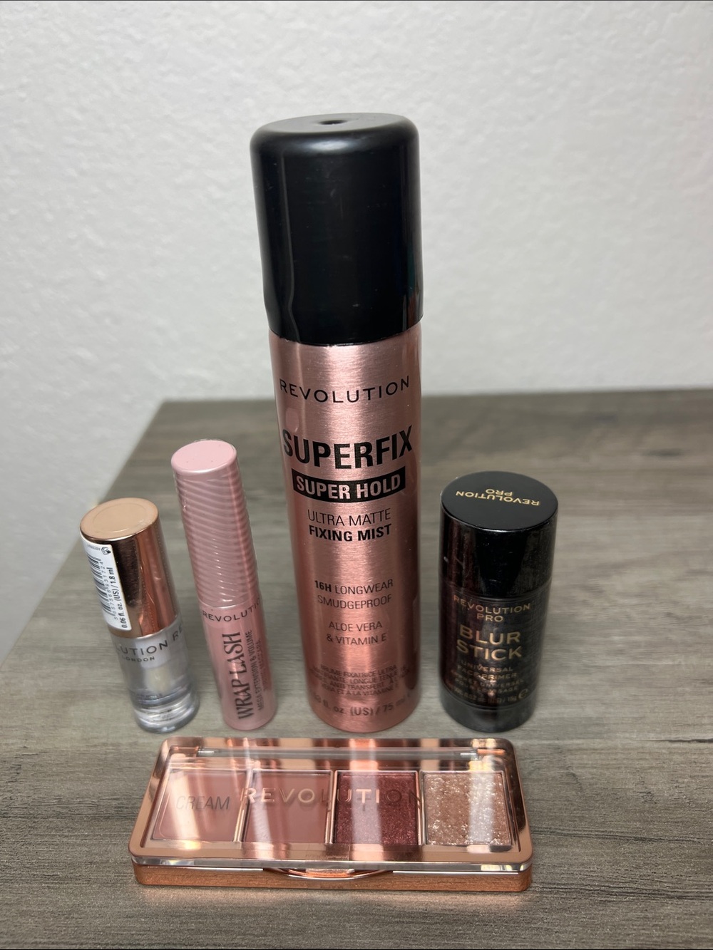 Revolution SuperFix Mist, Wrap Lash, Blur Stick, Plumping Lip Gloss & Eyeshadow